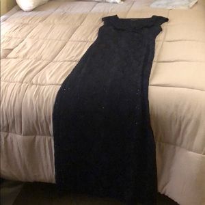 A sequin navy ball dress with a slit